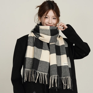 Classic plaid scarf for women with black and cream check pattern and fringe details