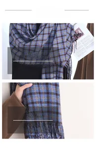 Detail of blue and brown checkered scarf with soft texture fringe and close-up fabric