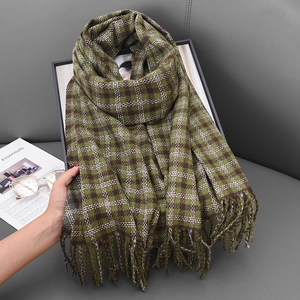 Retro green plaid cashmere scarf with long tassels and classic vintage checkered pattern