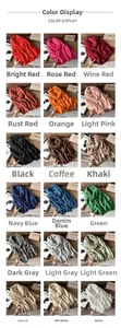 Multi-color display of pleated cashmere scarves showing 18 solid colors with fringe details