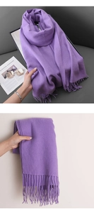 Detail of purple soft cashmere-like scarf showing exquisite fringe and thick texture