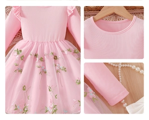 Detail of pink girls dress with ribbed cotton bodice and floral embroidered mesh skirt