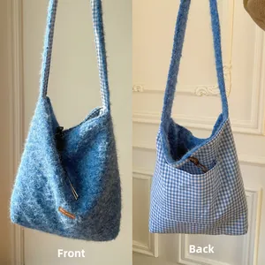 Dual-sided plush crossbody bag featuring bright blue faux fur and blue check fabric