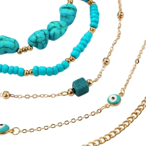 Bohemian multi-layer turquoise evil eye beaded anklet with golden accents for beach