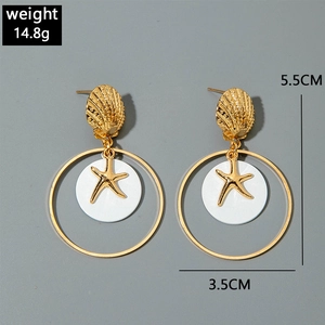 Detail of shell and starfish drop earrings with measurements showing 5.5cm length and 3.5cm width