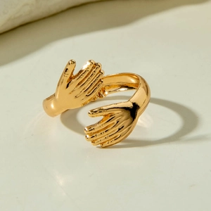 Minimalist gold hug ring featuring 3D double hand design and adjustable open band