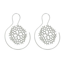 Detailed view of silver hollow lace drop earrings with intricate geometric honeycomb patterns