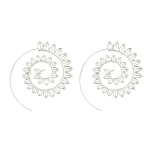 Close-up of silver spiral leaf earrings with intricate bohemian floral textures