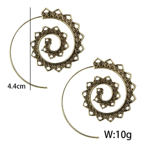 Detail view of retro bronze spiral earrings with hollow patterns, 4.4cm diameter size
