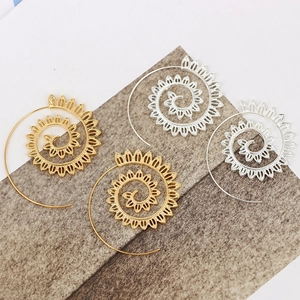 Spiral leaf earrings in gold and silver finish with detailed petal-like openwork texture