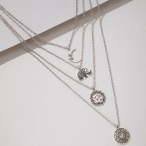 Retro multi-layered necklace featuring 3D elephant, crescent moon and Ohm symbol pendants