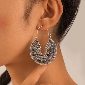 Bohemian vintage hollow flower pattern silver hoop earrings with geometric textures