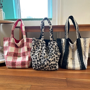Plush leopard and striped tote bags in wool-like fabric with handmade metal badge