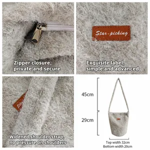 Fuzzy faux fur tote bag in grey with smooth zipper and wide shoulder strap detail