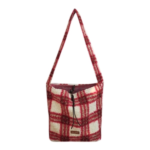 Winter plaid lambwool tote bag with red and white check pattern and drawstring closure
