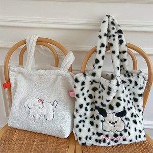 Cute leopard print and plush dog embroidery tote bags shown on a wooden chair