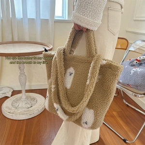 Sherpa fleece bucket bag in khaki with ghost print for autumn and winter style