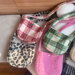 Various plush checkered crossbody bags in pink, green, and leopard print styles