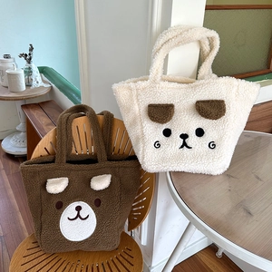 Detail of plush bear tote bags showing soft lamb wool texture and 3D ears