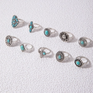 Detailed set of 10 bohemian rings with turquoise stones and floral engravings