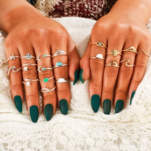 Bohemian style stackable ring set with celestial motifs in gold and silver finish