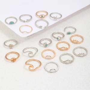 17pcs vintage ring set with sun moon arrow and turquoise stones on white background