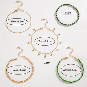 Detail view of 5-piece beach anklet set showing green beads and golden chain dimensions