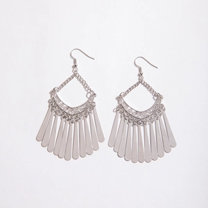 Detailed view of silver tassel earrings with bohemian hanging fan-shaped metal plates