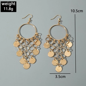 Detailed view of long gold tassel earrings with size dimensions and weight specs