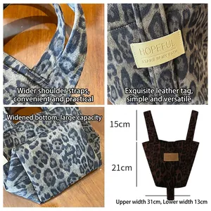 Leopard print canvas tote bag with leather label and wide shoulder straps for women