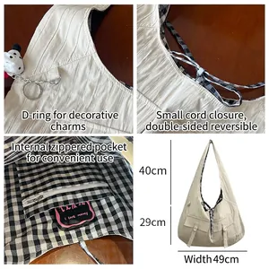 Beige large reversible canvas tote bag with black and white checkered lining for commute