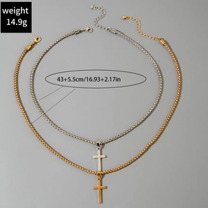 Detail of layered gold and silver cross necklaces with weight and length specifications