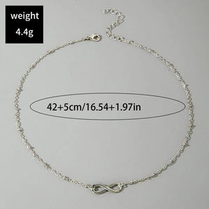 Detailed view of silver infinity necklace showing 4.4g weight and 42+5cm length specs