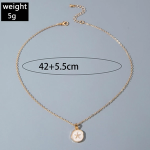 Detail view of a 5g gold starfish pendant necklace with 42+5.5cm adjustable chain length