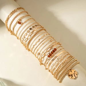 Multi-layer gold beaded bracelet set with coin pendant and diverse link chain designs