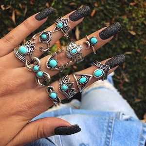 Set of 10 vintage silver bohemian rings featuring blue turquoise and tribal carvings