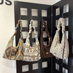Winter faux fur drawstring shoulder bags with scrunchie straps in various patterns