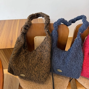 Winter plush drawstring tote bag in dark brown, navy blue, and peach pink colors