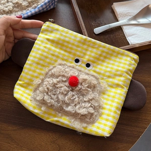 Cute yellow checkered cosmetic bag with 3D cartoon plush design and zipper closure