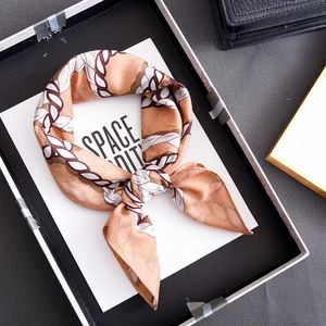 Elegant luxury silk-like scarf with contrast rope pattern in a minimalist gift box