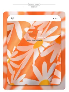 Detail of 70x70cm orange floral silk-feel scarf with daisy patterns and soft texture