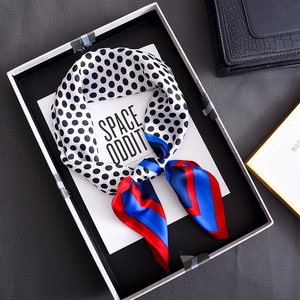 Elegant polka dot silk square scarf in black and white with red and blue geometric blocks