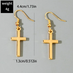 Detailed view of gold cross drop earrings with size measurements and hook design
