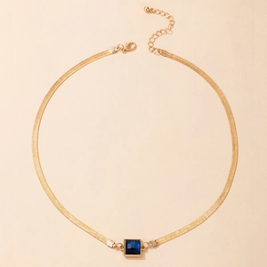 Golden snake chain necklace featuring a square blue gemstone pendant with lobster clasp