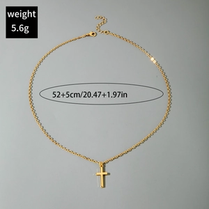 Detail of gold cross pendant necklace showing 5.6g weight and 52cm chain length specifications