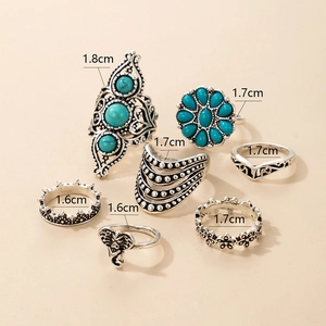 Detailed size guide for 7-piece vintage silver boho elephant and turquoise ring set