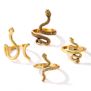 4-piece vintage golden snake ring set with polished finish and scaled textures