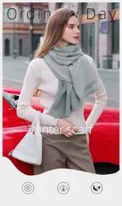 Outdoor shot of a woman wearing a Morandi grey-green pleated cashmere feel winter scarf