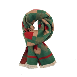 Diamond patterned knit scarf for kids with warm red and green tassels on white backdrop