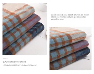 Close-up of tartan knit texture and fringe edge on a blue and caramel checkered scarf